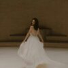 Celeste-AtelierSwan-sur-jupe-diamond.jpeg Robe de mariée romantique fluide sans dentelle Atelier Swan