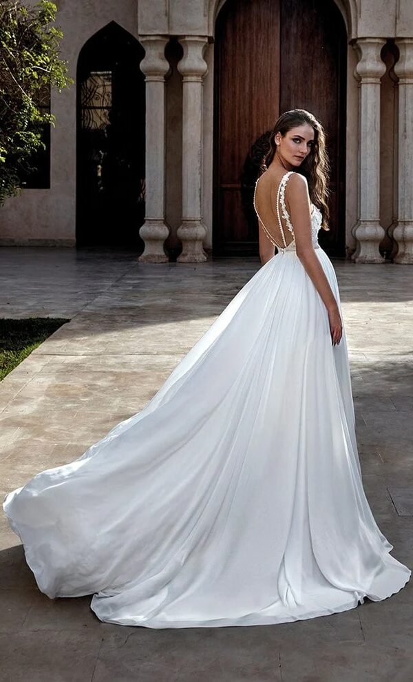 Robe de mariée de seconde main dos nu en dentelle 3D et mousseline chez La Sève à Lyon