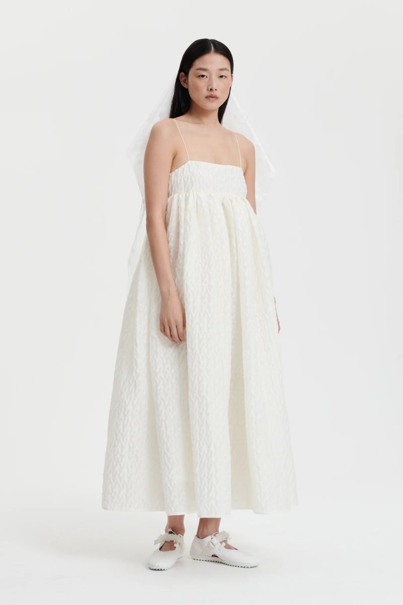 Robe de mariée mi-longue de seconde main chez La Sève à Lyon