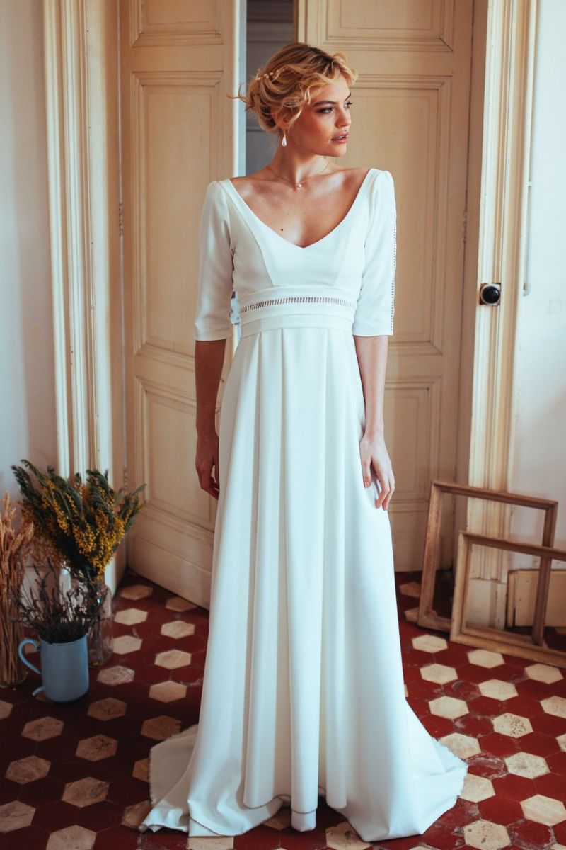 Robe de mariée col V et dos nu fluide de seconde main chez La Sève à Lyon